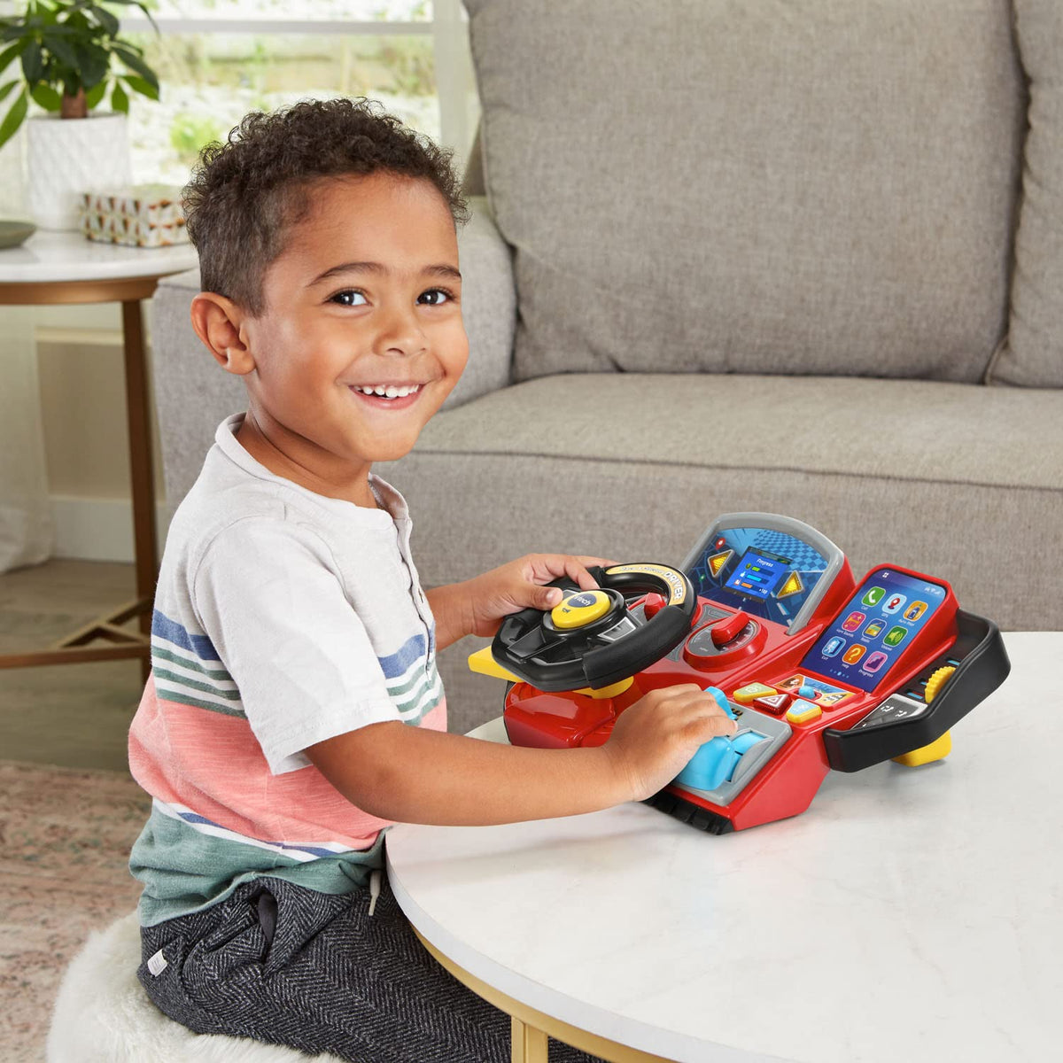 VTech Race and Discover Driver dashboard buttons for calls, maps, and music—interactive exploration