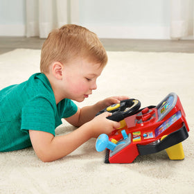 VTech Race and Discover Driver gas station activity with counting moments