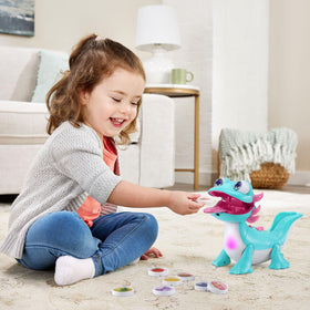 VTech Sandy Snacks-a-Lot stores snacks inside her tail for easy cleanup.