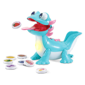 VTech Sandy Snacks-a-Lot sniffs a snack piece under her nose to spark interactive play.