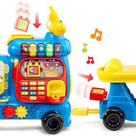 VTech Alphabet Train blue blocks on train side for letter recognition practice.