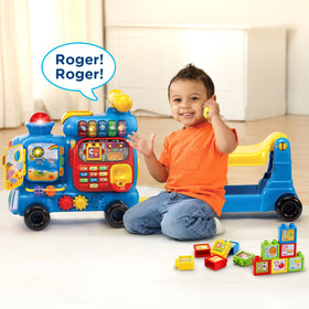 VTech Alphabet Train blue action shot with kids learning.