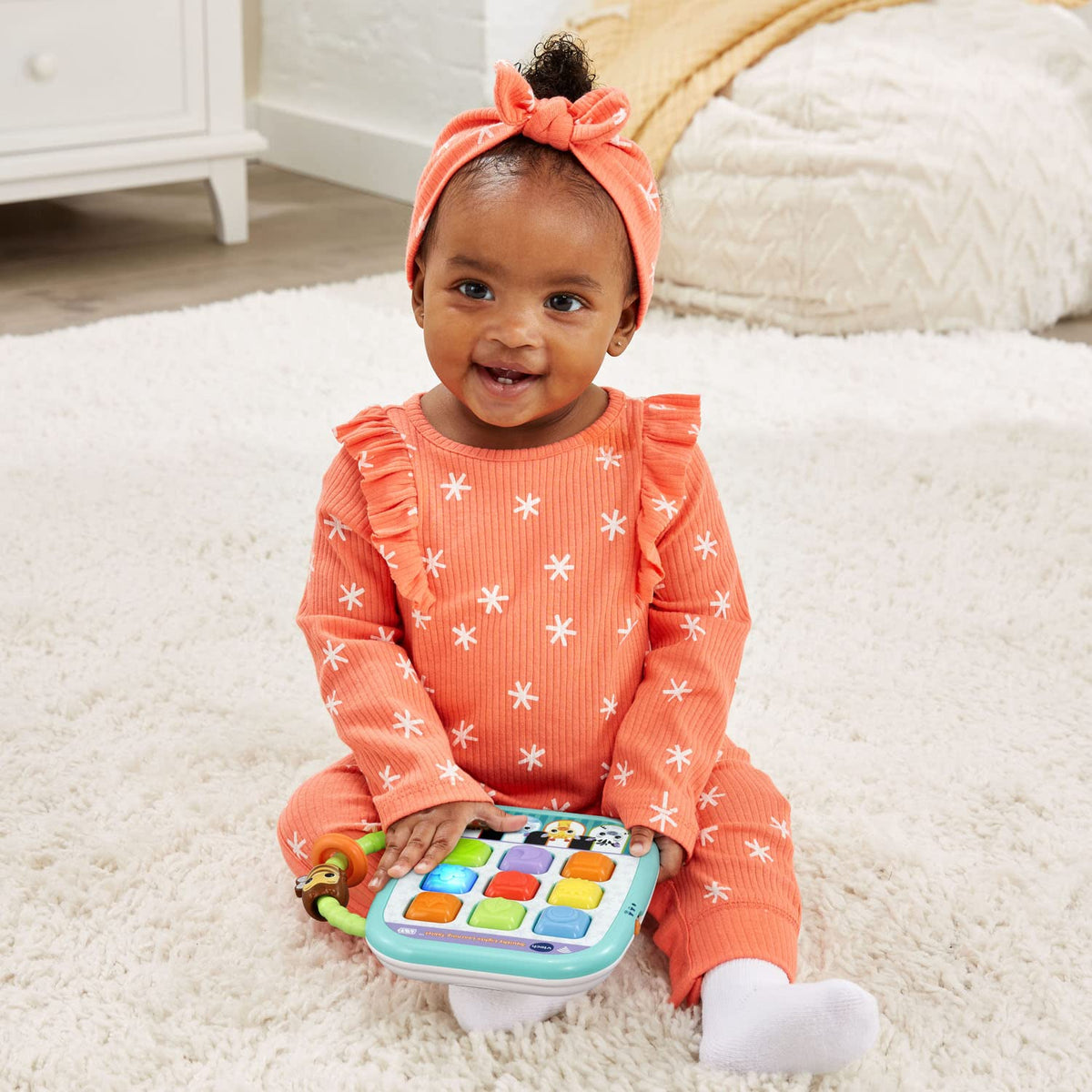 VTech Squishy Lights color-squares close-up; bright hues support visual tracking and color discovery.