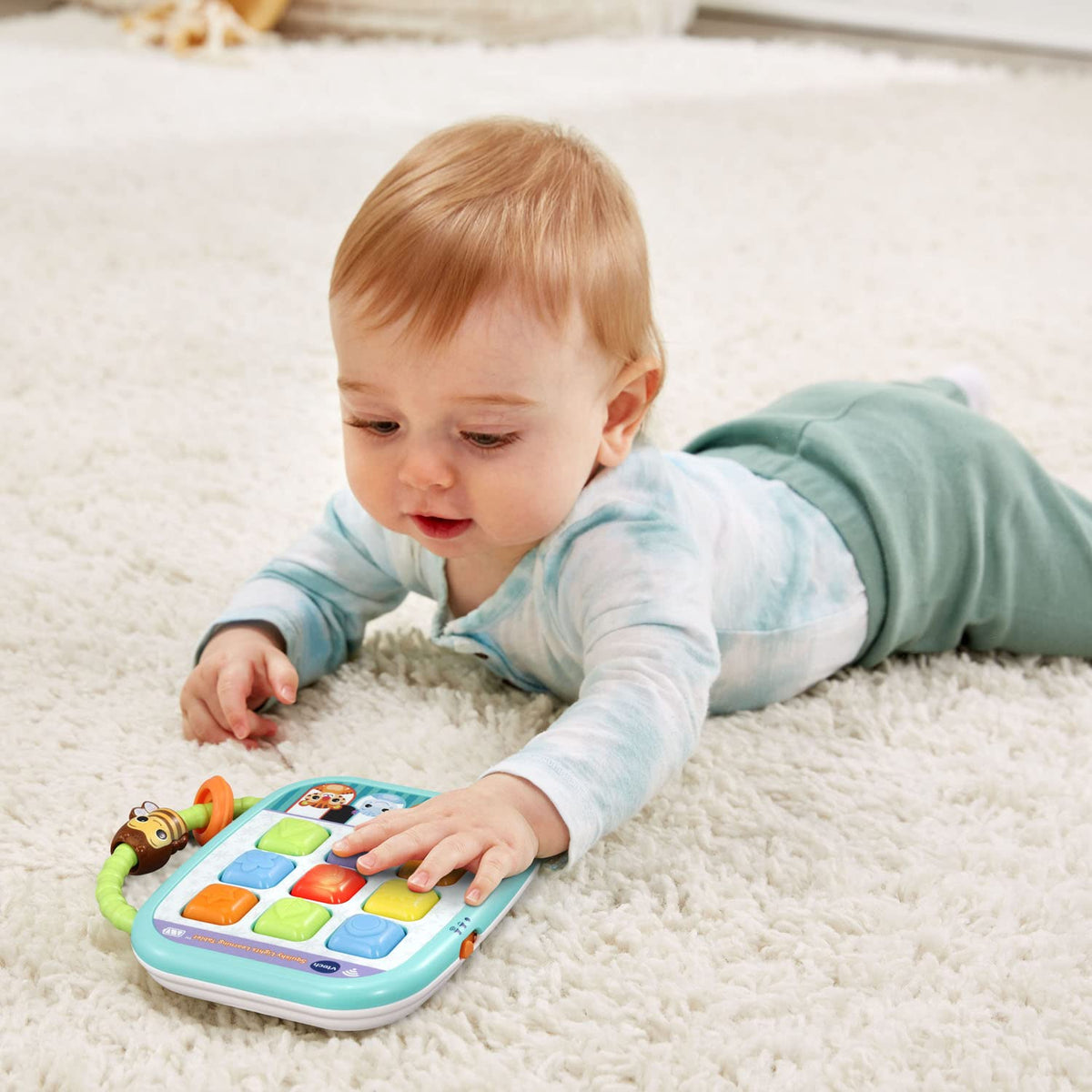 VTech Squishy Lights tablet side view; compact design for easy on-the-go play.