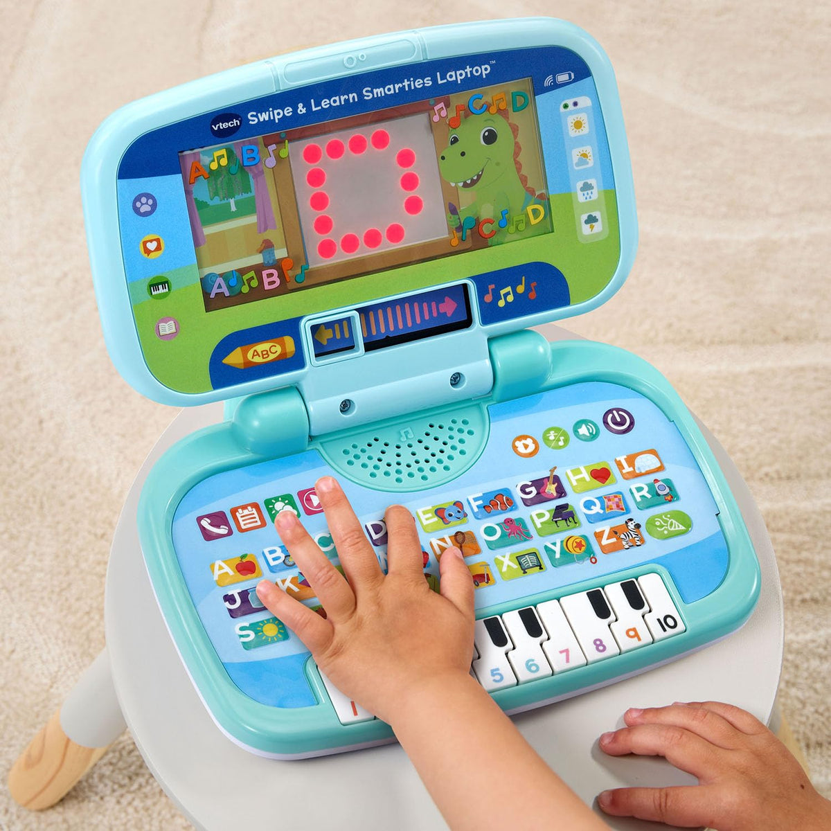 VTech Swipe and Learn Smarties Laptop instrument selection expands creative play options.