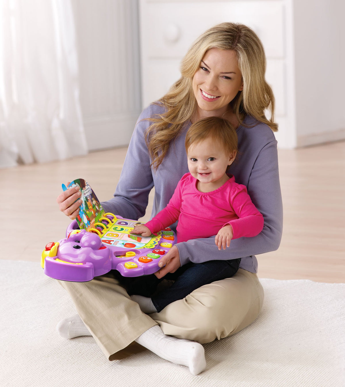 VTech Touch and Teach Elephant Purple buttons reveal numbers, piano sounds, and playful feedback