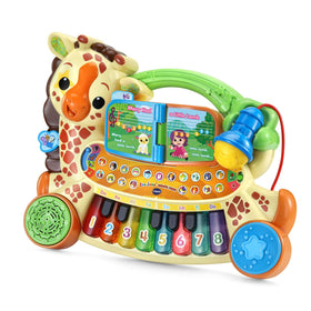VTech Zoo Jamz Giraffe Piano child pressing keys during creative performance