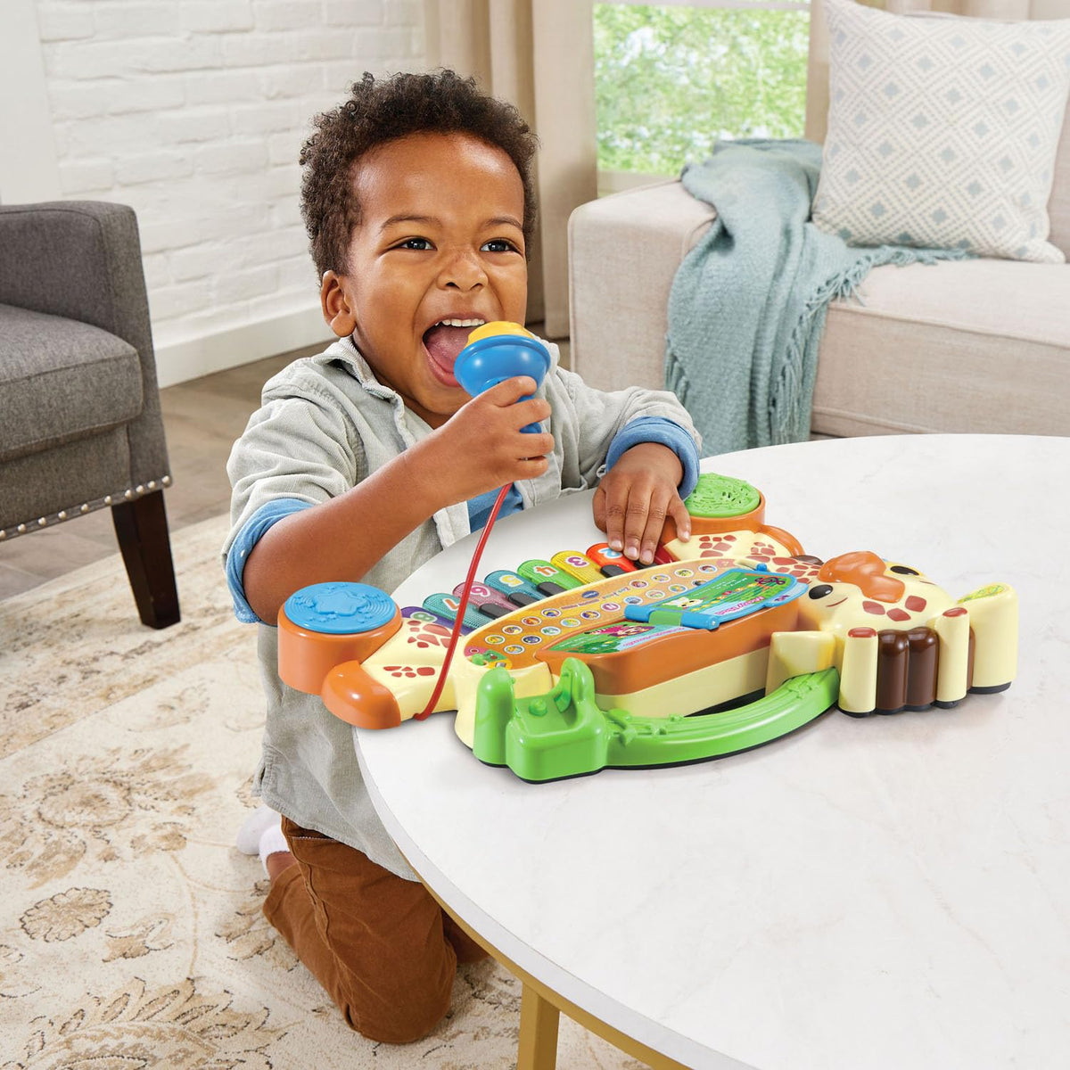 VTech Zoo Jamz Giraffe Piano microphone allows harmonizing and singing