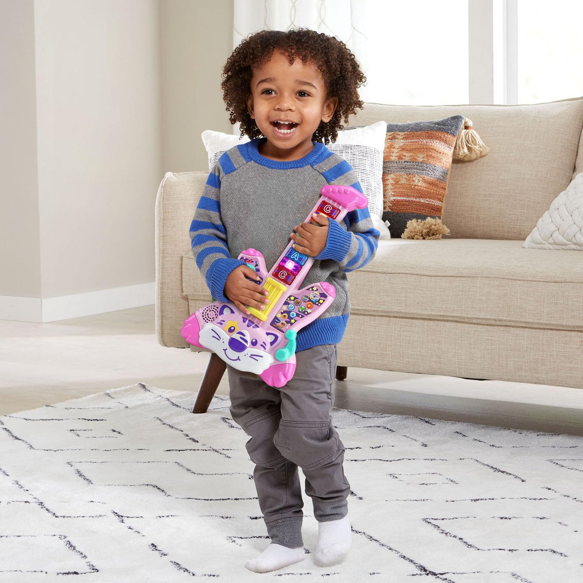VTech Zoo Jamz Tiger Rock Guitar in Animal Band mode offers cooperative pretend performances.
