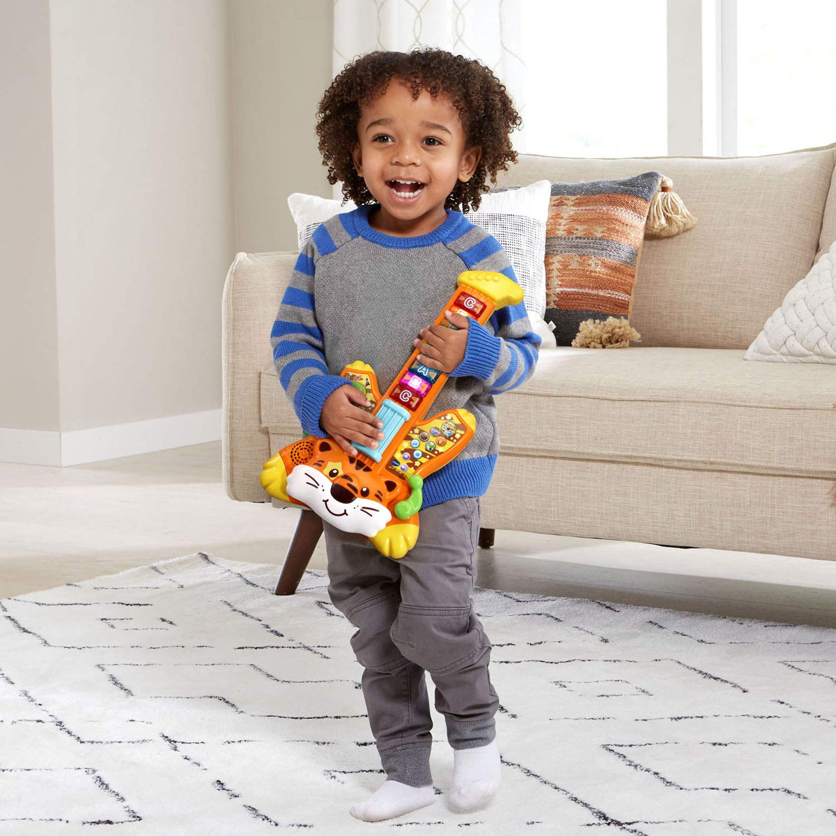 VTech Zoo Jamz Tiger Rock Guitar orange knobs offering multiple style options