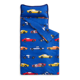 Wake In Cloud nap mat with blue race cars unrolled for cozy kindergarten naps.