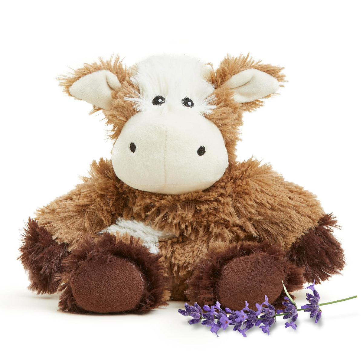 Warmies Cow Junior plush heated for soothing warmth during bedtime.