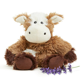Warmies Cow Junior plush heated for soothing warmth during bedtime.