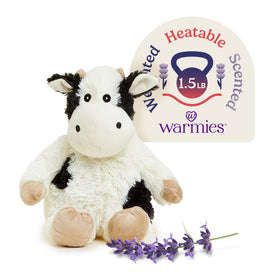 Warmies Cow microwavable plush provides cozy warmth for cuddling.