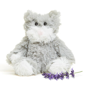 Warmies Junior Cat plush being heated for cozy bedtime warmth.