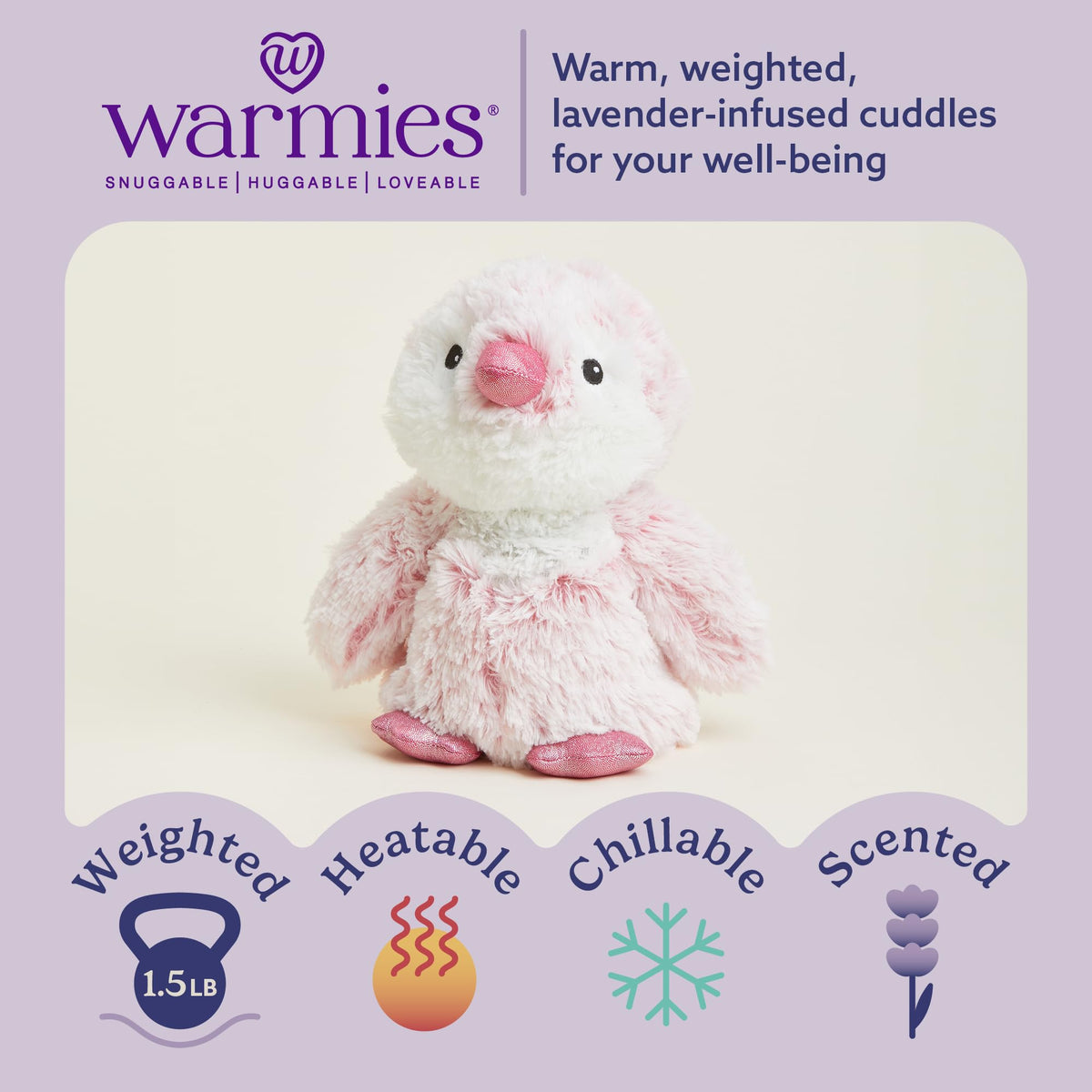 Warmies pink penguin heated demonstration showing microwave heat for warmth.