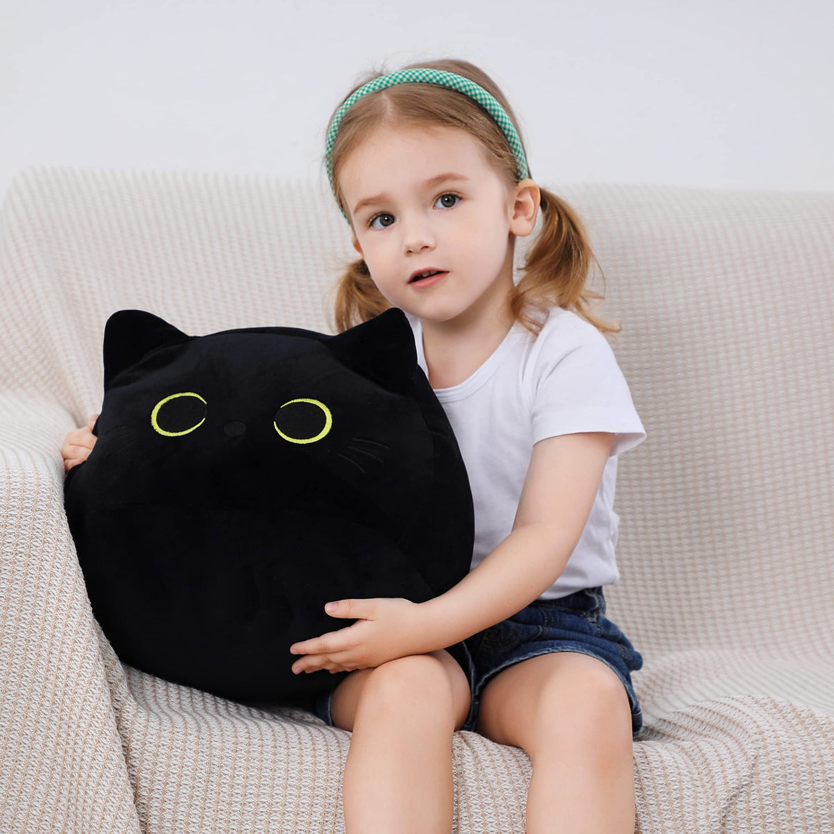 WeBingo black cat plush fur close-up shows soft, skin friendly texture.