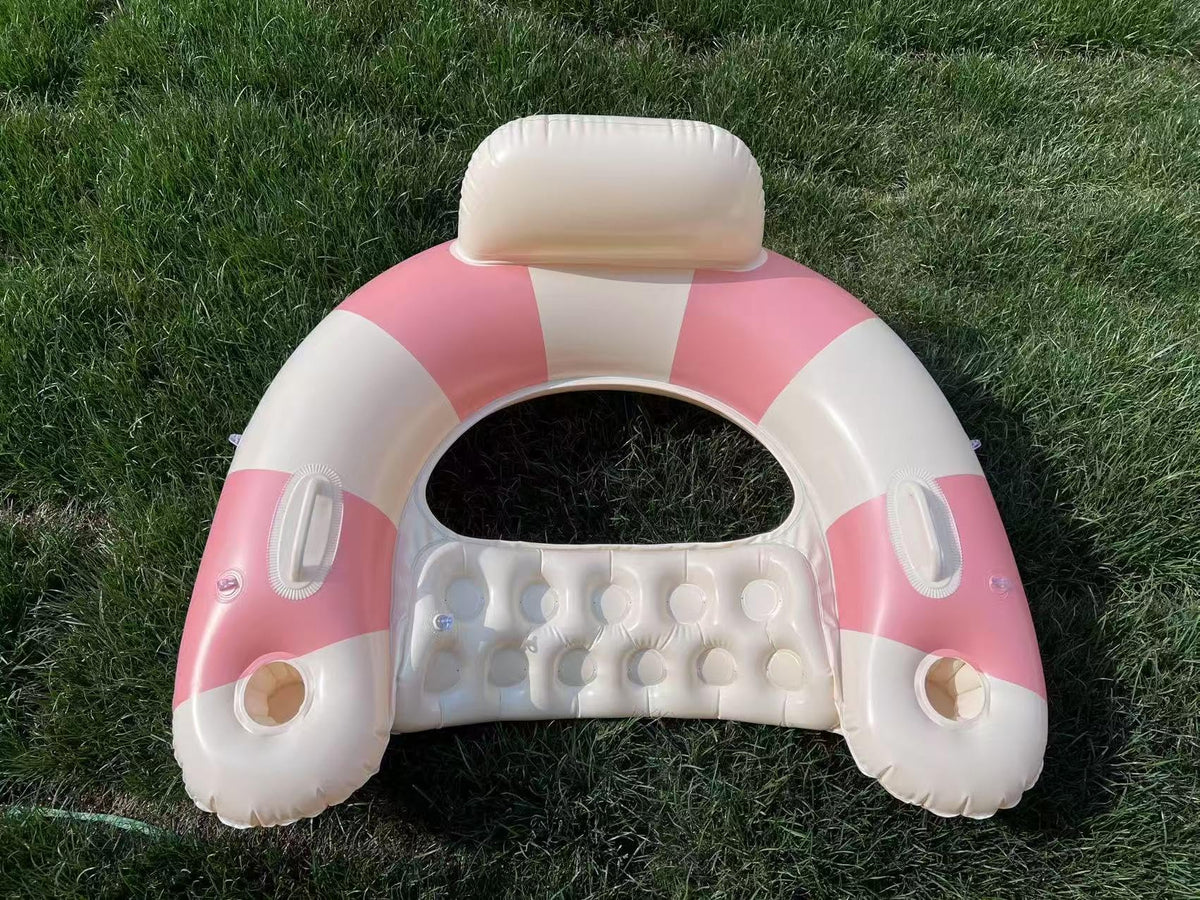 WeddPtyFr retro pink chair enhances summer relaxation by the water.