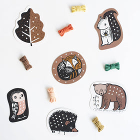 Wee Gallery Woodland Lacing Cards promote pattern recognition during play.