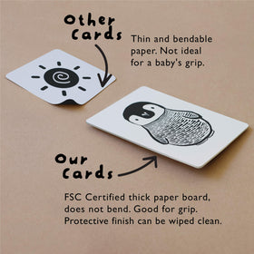 Wee Gallery high-contrast dolphin card supports focus with friendly ocean shapes