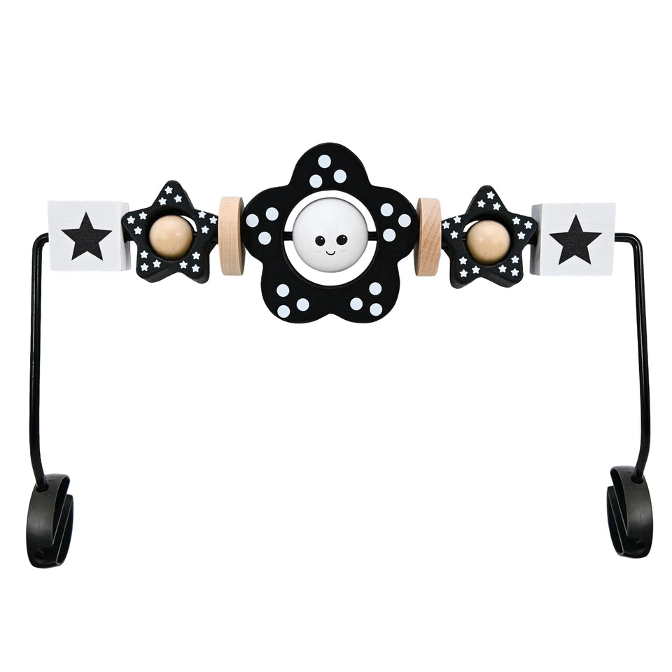 Welgep wooden toy bar attachment on a baby bouncer showing a secure install for safe play