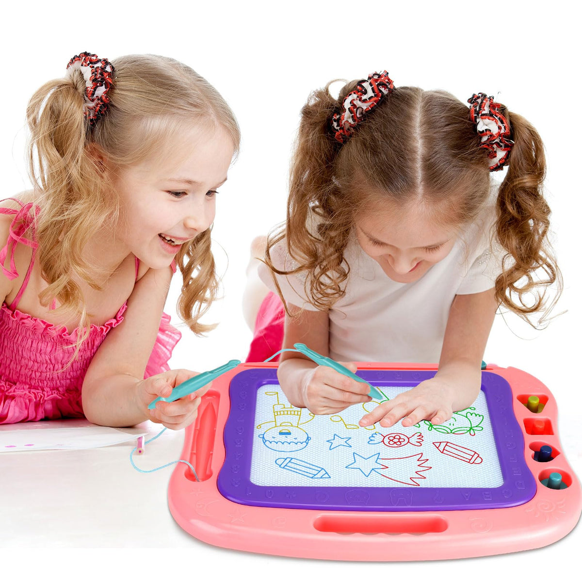 Wellchild kids enjoying a doodle session together with the board.