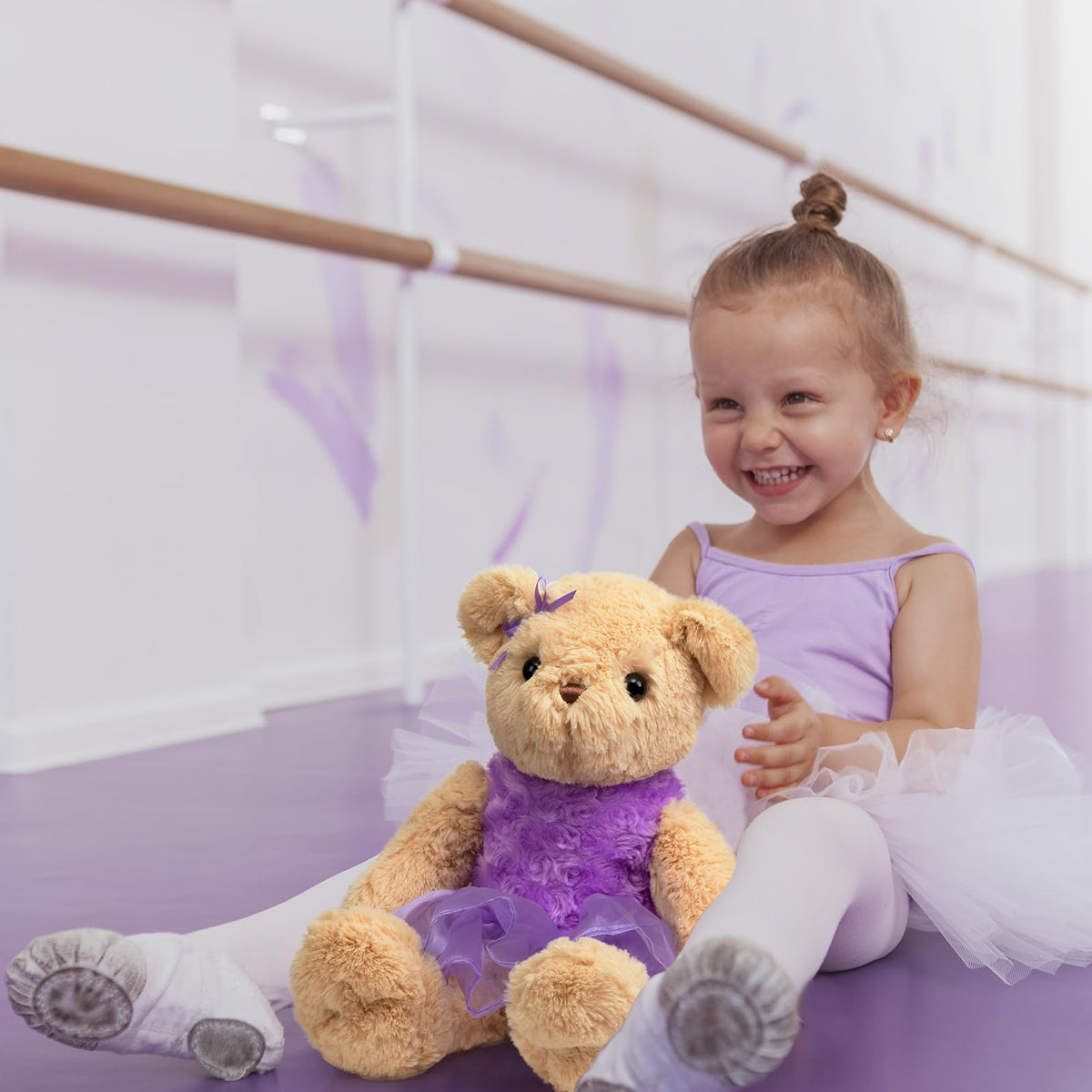 WENMOTDY close up of purple tulle tutu on plush bear