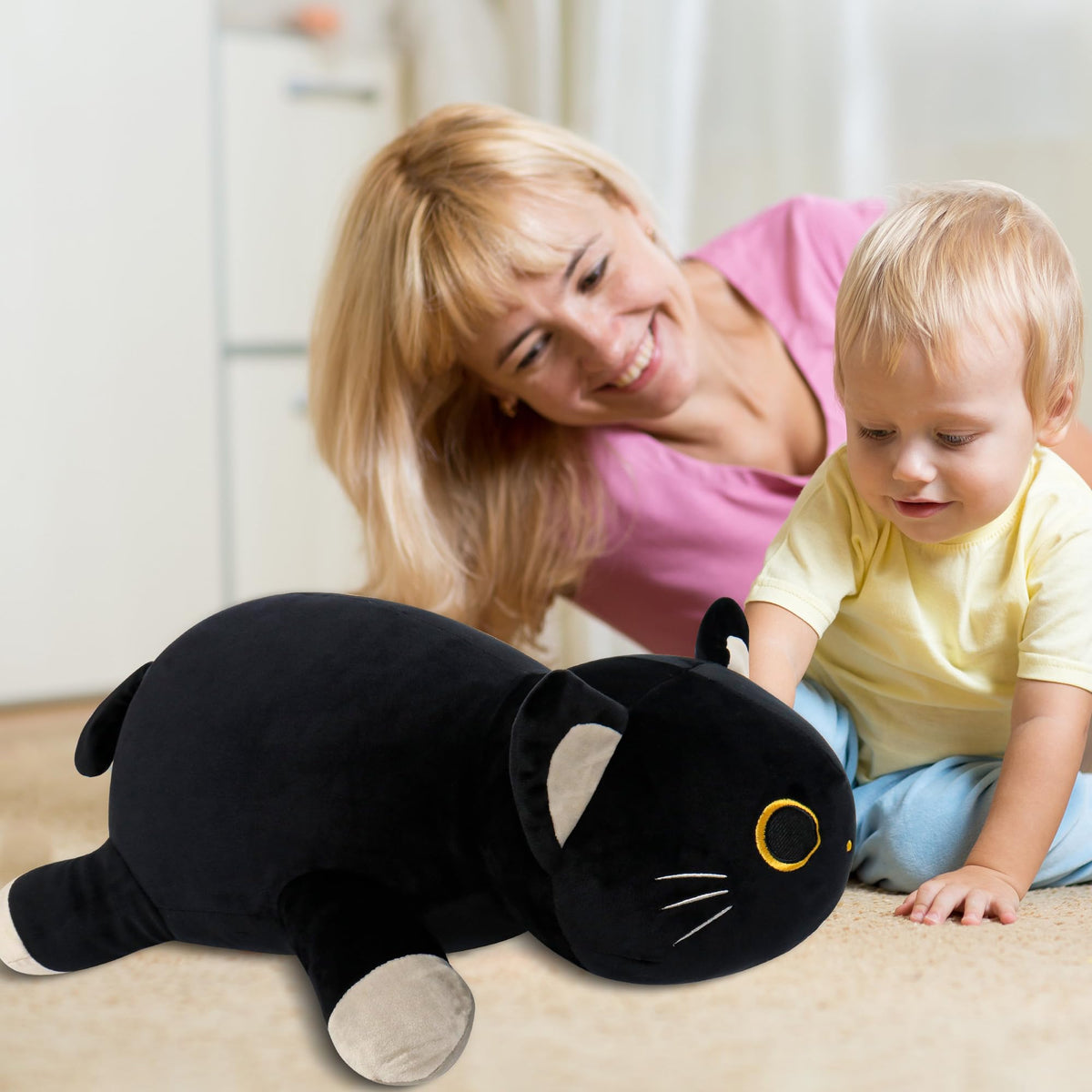 WePop black cat plush in a cozy bedroom corner evokes soft nighttime comfort