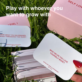Prompts for past, present, and future self-discovery on the cards.