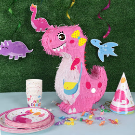 Vibrant pink dinosaur design complements a dino-themed party
