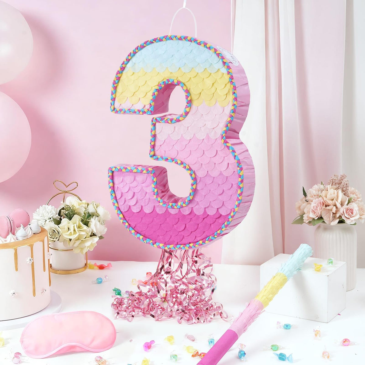 WERNNSAI Pinata with pink to blue ombré fade and aquatic scale pattern for celebrations.