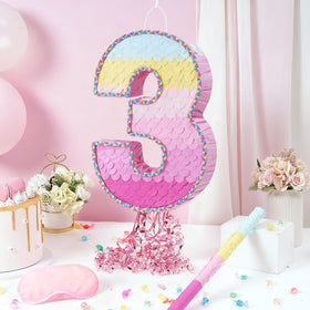 WERNNSAI Pinata with pink to blue ombré fade and aquatic scale pattern for celebrations.