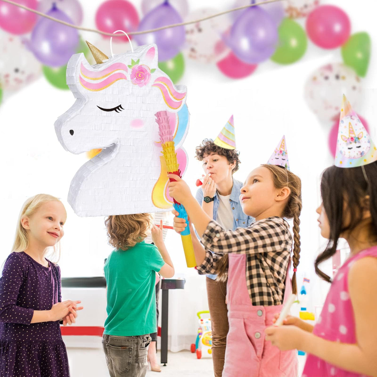 WERNNSAI unicorn pinata in festive party setup and celebration.