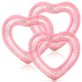Whaline rose gold heart pool float with glitter inside, perfect for glamorous pool moments.