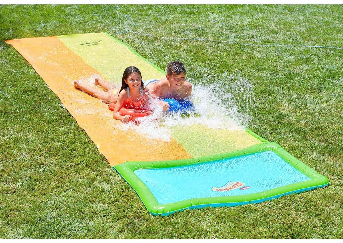 Wham-O Slip N Slide 18ft kids playing on a colorful surface