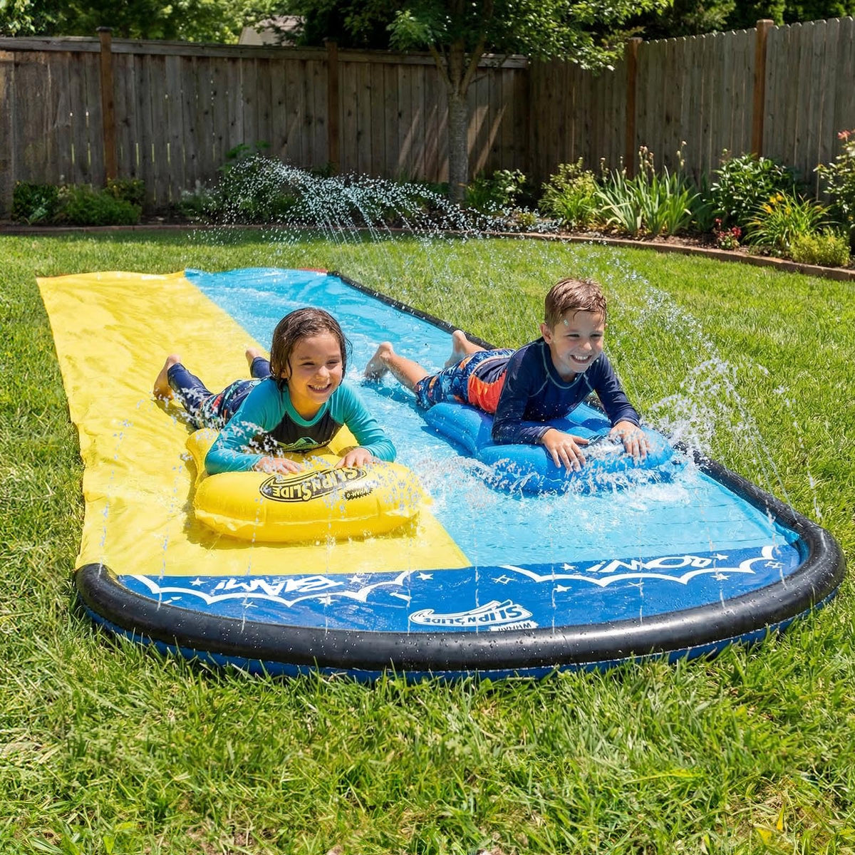 Wham-O Slip N Slide 18ft Double Wave in action for backyard cooling fun.