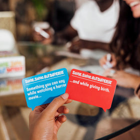 What Do You Meme? Same Same Different game-night setup enhances laughter and social bonding.