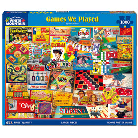 White Mountain 1000-piece puzzle close-up showing oversized pieces on blue chipboard.