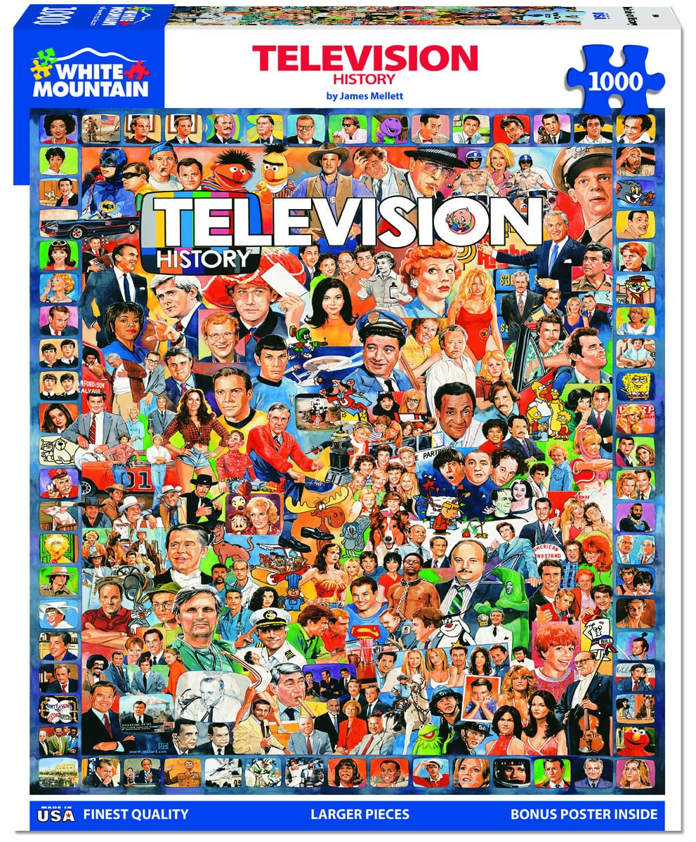 White Mountain Television History puzzle pieces spread across the table for collaboration.