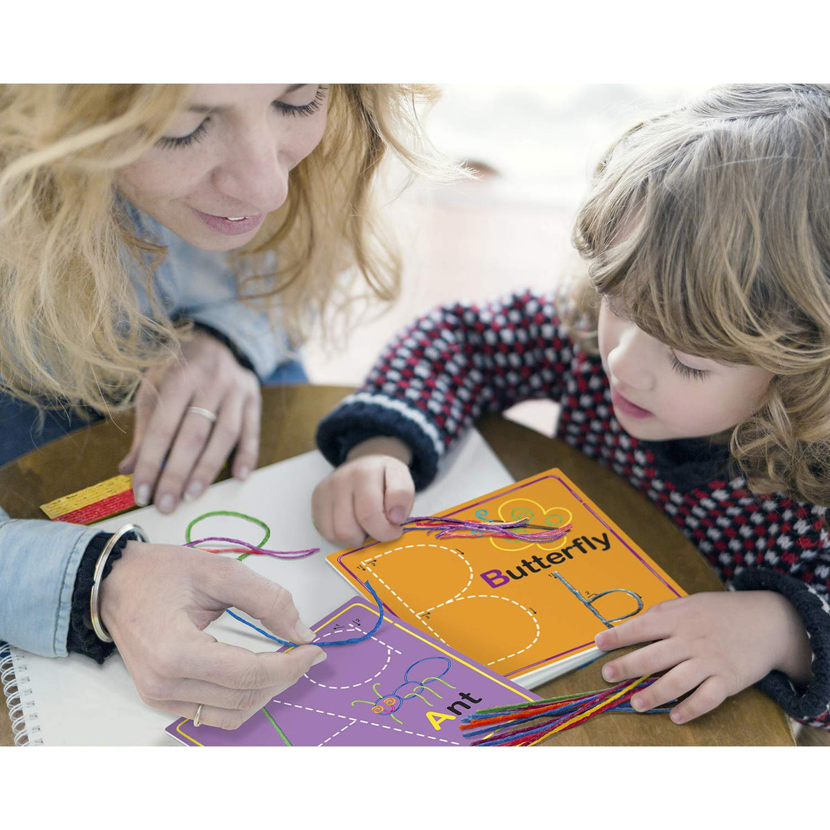 Wikki Stix cards feature directional arrows to guide proper letter formation.