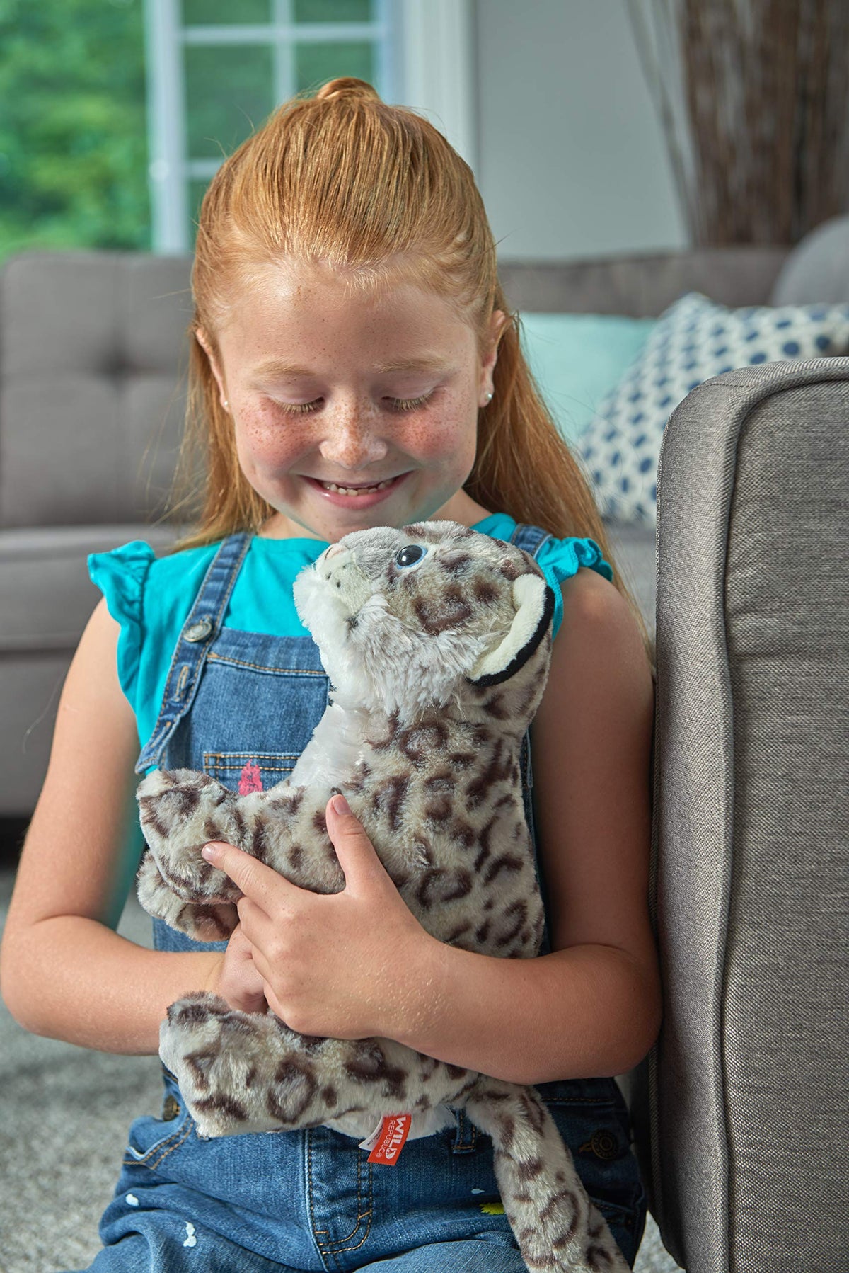 Close-up of Wild Republic Snow Leopard plush showing realistic details and soft fur