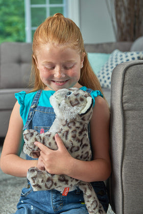 Close-up of Wild Republic Snow Leopard plush showing realistic details and soft fur