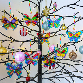 Winlyn rainbow paints collection provides vivid colors for creative suncatcher designs.