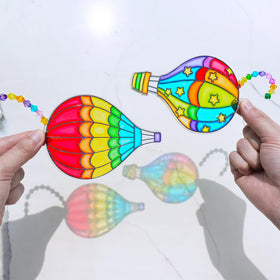 Winlyn suction hooks for secure window display of finished suncatchers.