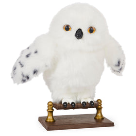 Wizarding World Enchanting Hedwig on perch with lifelike head turns and soft plush.