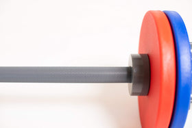 WOD Toys Barbell Mini kid using it with a smile and coordination