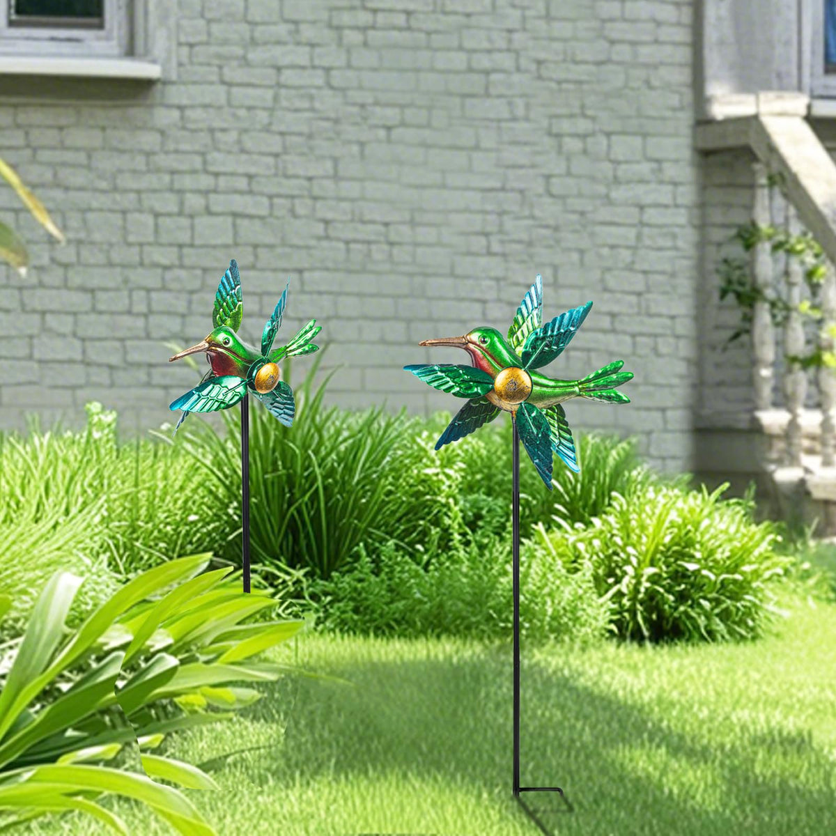 WONDER GARDEN wind spinner on lawn near parterres for focal point