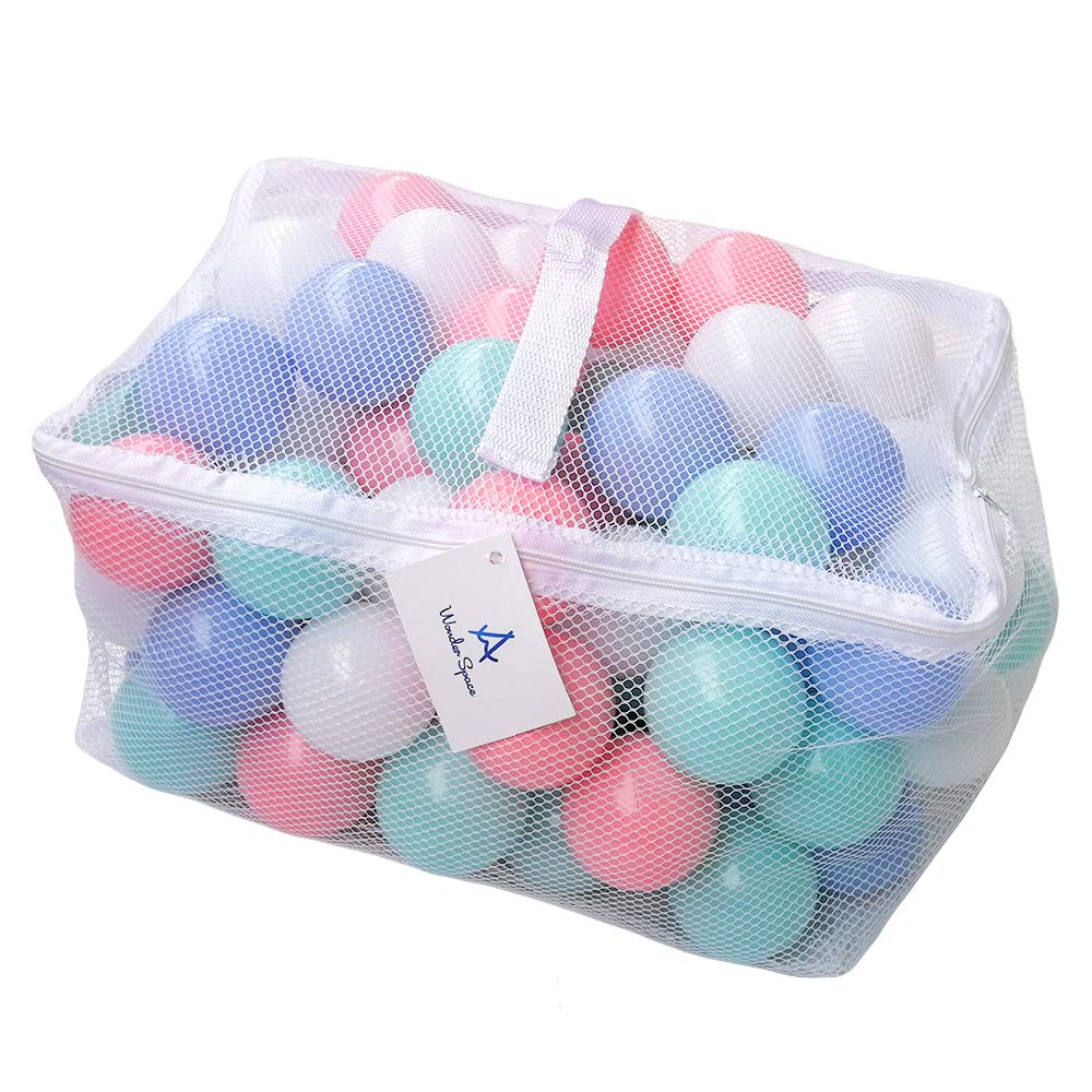 Wonder Space pastel pit balls in mesh bag for tidy storage and safe play.