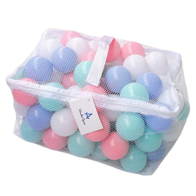 Wonder Space pastel pit balls in mesh bag for tidy storage and safe play.