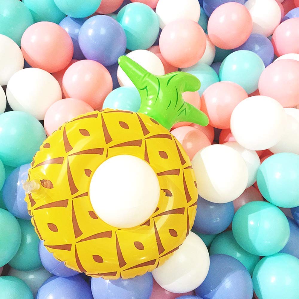 Wonder Space mesh storage bag with pastel pit ball set to reduce clutter.